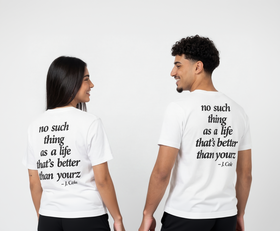 Two people wearing white t-shirts with a motivational quote on a plain background
